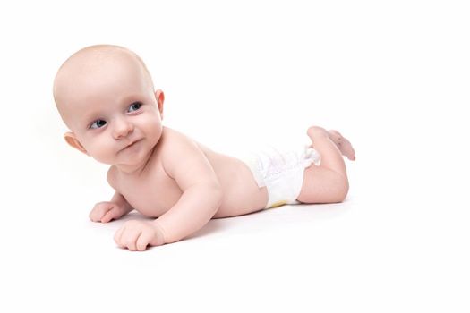 baby on a white isolated background in a diaper.