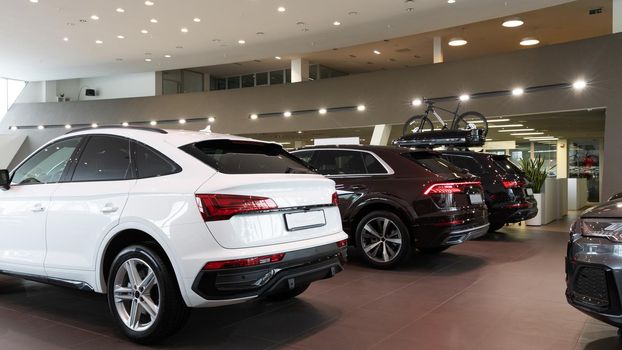 modern luxury SUVs in the showroom.