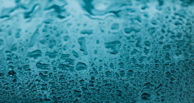 Liquid, wet and zen concept - Water texture abstract background, aqua drops on turquoise glass as science macro element, rainy weather and nature surface art backdrop for environmental brand design