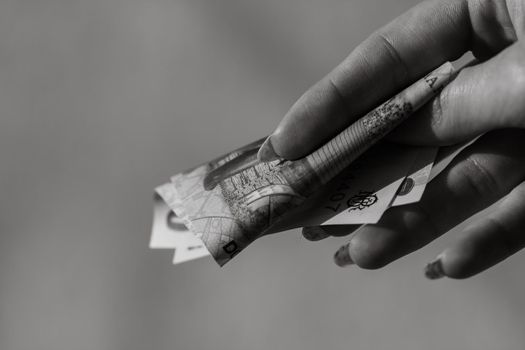 Selective focus on detail of LEI banknotes. Counting or giving Romanian LEI banknotes. World money concept, inflation and economy concept