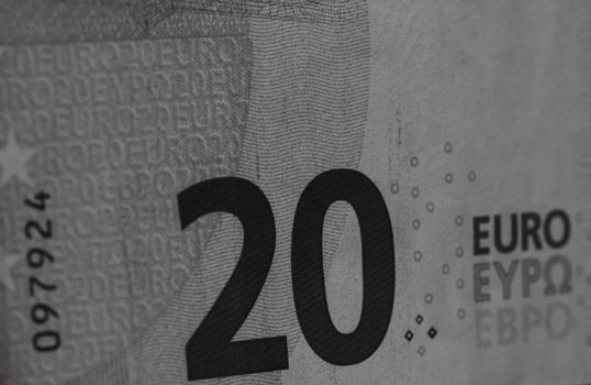 Selective focus on detail of euro banknotes. Close up macro detail of money banknotes, 20 euro isolated. World money concept, inflation and economy concept