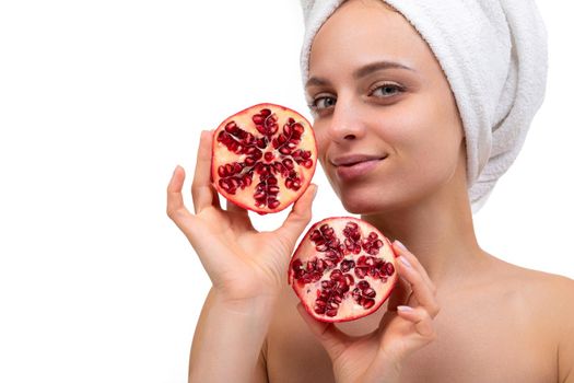 young woman after shower with grapefruit in hand, Concept vitamins and minerals for skin.