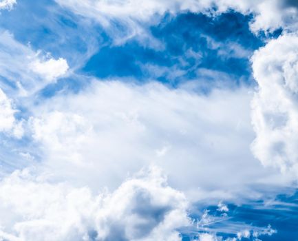 Nature backdrop, solar energy and spiritual concept - Blue sky background, white clouds and bright sunlight