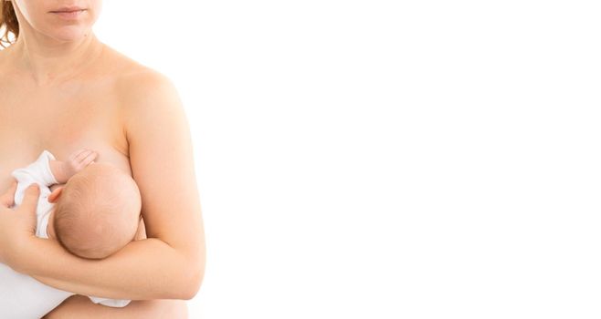 mother feeding baby breast milk on white background.