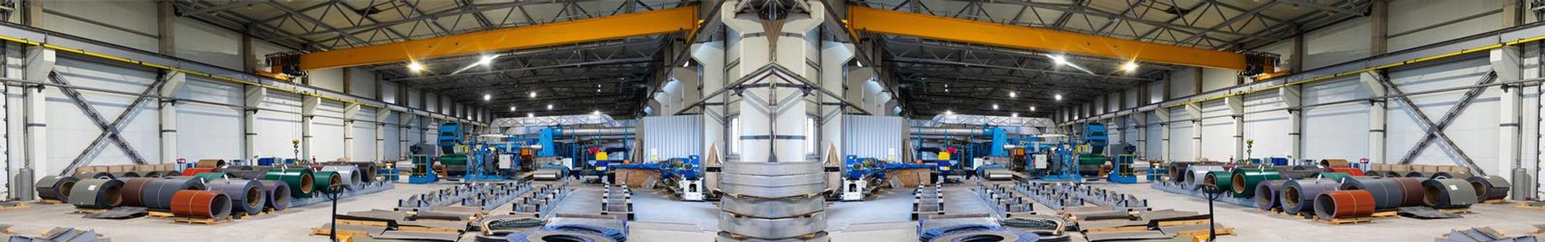 Panoramic mirror photo shot. Metal sheet profile forming machine, process of making steel tile for roof, industrial manufacturing. Background of plant and factory. Industrial concept.