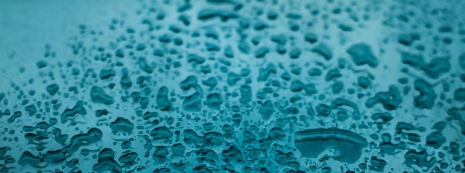 Liquid, wet and zen concept - Water texture abstract background, aqua drops on turquoise glass as science macro element, rainy weather and nature surface art backdrop for environmental brand design