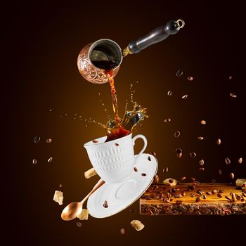 Falling coffee cup. Cup of coffee splashes while falling. Splash in white coffee cup. Hot beverage splashing, food levitation