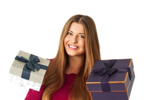 Birthday, Christmas gifts or holiday present, happy woman holding gift boxes isolated on white background, portrait