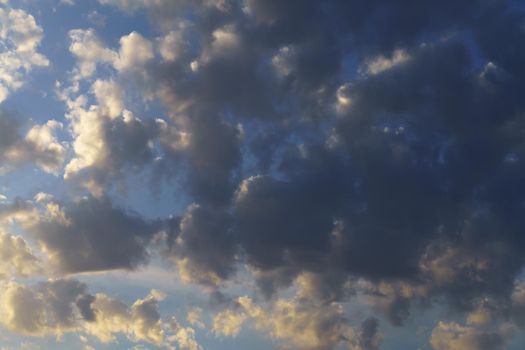 colorful dramatic sky at dawn with storm clouds