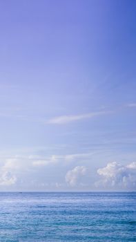 VERTICAL Atmosphere panorama real photo beautiful summer white cloud clear blue PURPLE tone sky horizon line calm sea. Concept paradise life. Design relax wallpaper background. More format in stock.
