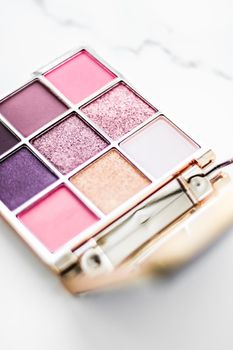 Cosmetic branding, fashion blog and glamour set concept - Eye shadow palette swatches on marble background, make-up and eyeshadows cosmetics product for luxury beauty brand and holiday flatlay design