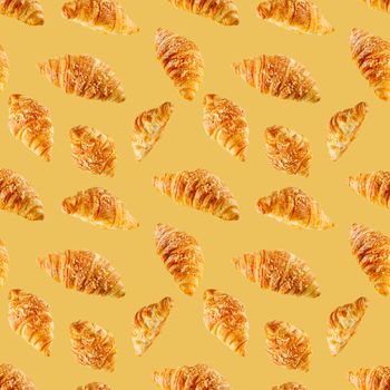 seamless pattern made from Fresh croissant isolated on brown background. Bakery pattern with baked croissant with cheese.