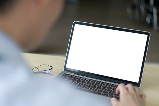 Mock up screen laptop on desk.  Workspace officer for freelance