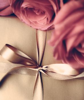 Vintage design, shop sale promotion and happy surprise concept - Luxury holiday golden gift box and bouquet of roses as Christmas, Valentines Day or birthday present