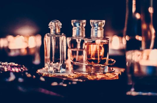 Perfumery, cosmetic branding and spa concept - Perfume bottles and vintage fragrance at night, aroma scent, fragrant cosmetics and eau de toilette as luxury beauty brand, holiday fashion parfum design