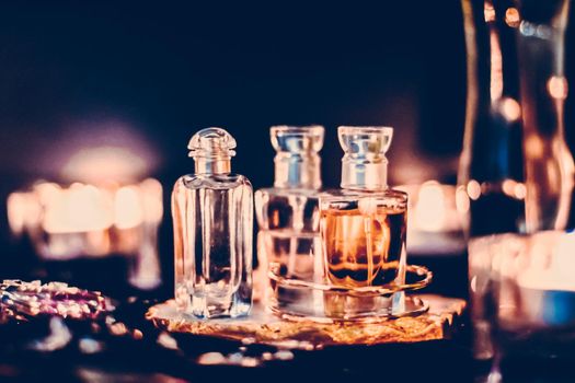 Perfumery, cosmetic branding and spa concept - Perfume bottles and vintage fragrance at night, aroma scent, fragrant cosmetics and eau de toilette as luxury beauty brand, holiday fashion parfum design