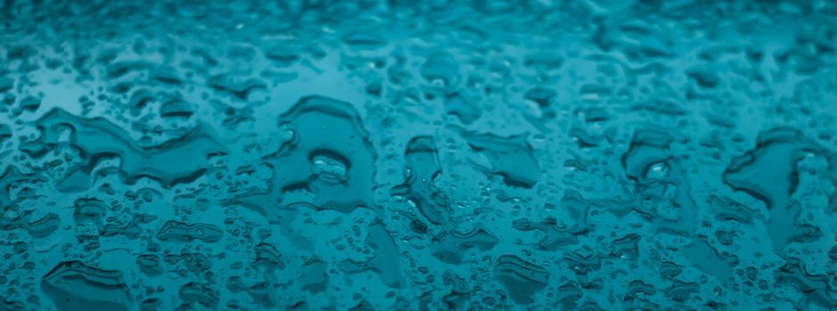 Liquid, wet and zen concept - Water texture abstract background, aqua drops on turquoise glass as science macro element, rainy weather and nature surface art backdrop for environmental brand design