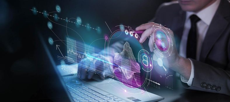 A man in a suit works with infographic data of digital property growth on a virtual panel.