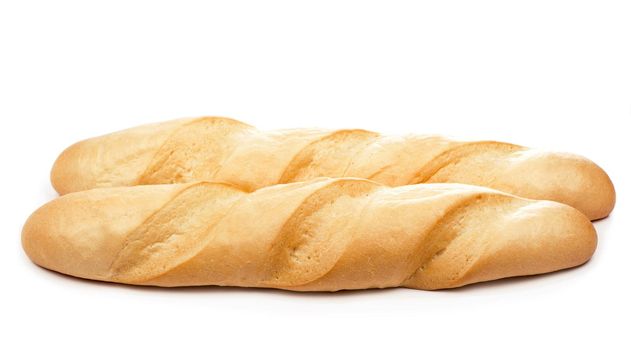 Large loaf of bread isolated on white