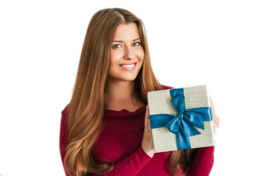 Christmas holiday present, happy woman holding a gift or luxury beauty box subscription delivery isolated on white background, portrait