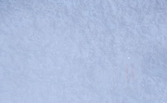 Blue abstract background. Background from blue stucco. Wall with old light blue paint.