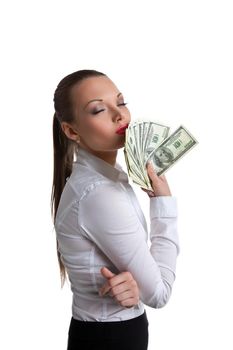 young sexy business woman kiss a bundle of money isolated