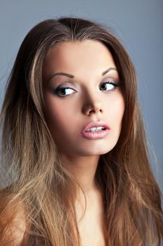 Portrait of beautiful and sexy young woman look a side