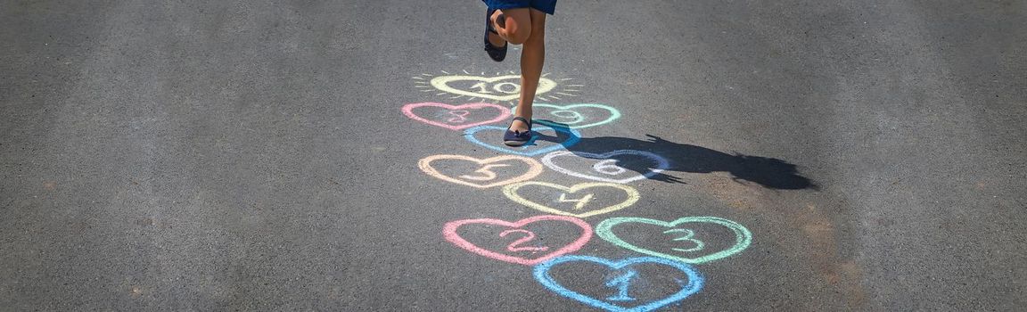 Children's hopscotch game on the pavement. selective focus. nature.