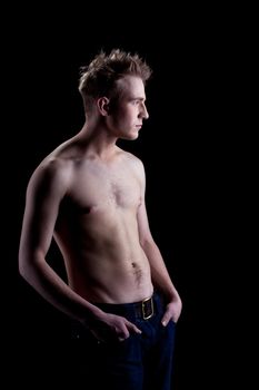 Studio portrait of young man with naked torso