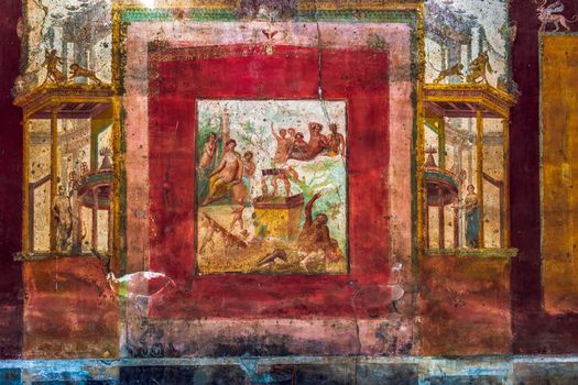 Pompeii, Italy Triclinium Roman House of Siricus ancient colourful fresco painting on the wall portraying Drunken Hercules.