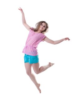 Smiling young woman jumping. Isolated on white