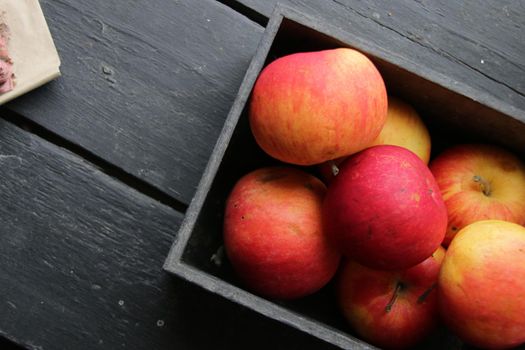 Ripe red apples on wooden table. Top view. High quality photo