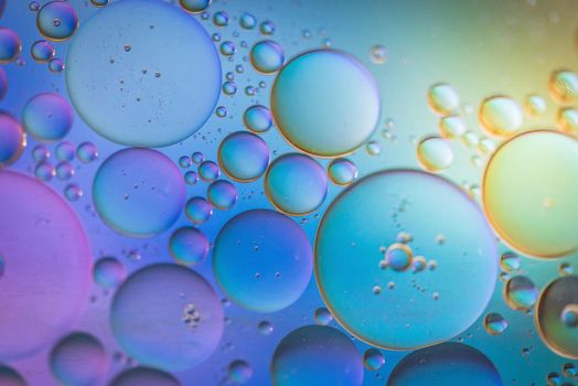 Oil drops in water. Abstract psychedelic pattern image multicolored. Abstract background with colorful gradient colors. Dof.