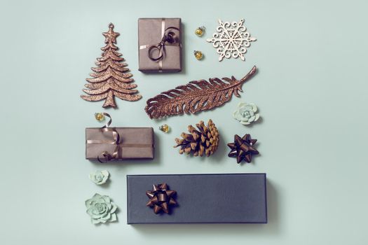 Christmas New Year flatlay with gifts and holiday decor top view. Creative modern layout. Christmas knolling
