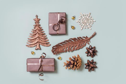 Christmas New Year flatlay with gifts and holiday decor top view. Creative modern layout.