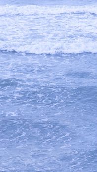 Real photo sea water waves, abstract background, nature power, pale light blue more tone in stock.