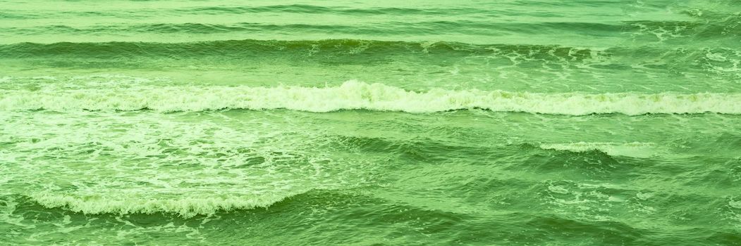 Real photo sea water waves, abstract background, nature power, bright green more tone in stock.