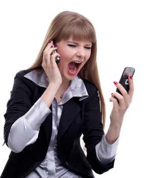 Portrait of stressed business woman with two mobile phones. Isolated on white