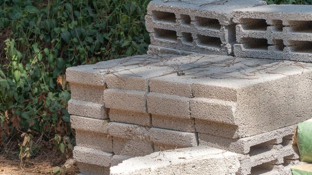 Concrete bricks and blocks on the street, building material for repair and construction. High quality photo