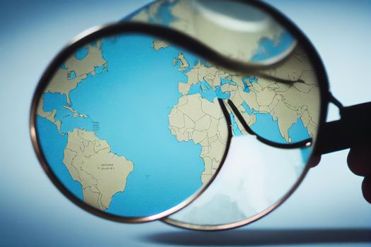 Blue tack on map of the world with magnifying glass looking in on Tokyo Japan , style U1 1
