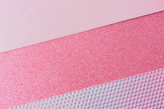 Shiny and glittering surfaces. Pink and holographique abstract background. Events, celebrations. Trendy backdrop for your design. Texture with glitter