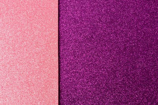 Shiny and glittering surface. Pink and violet, abstract background. Events, celebrations. Trendy backdrop for your design. Texture with glitter