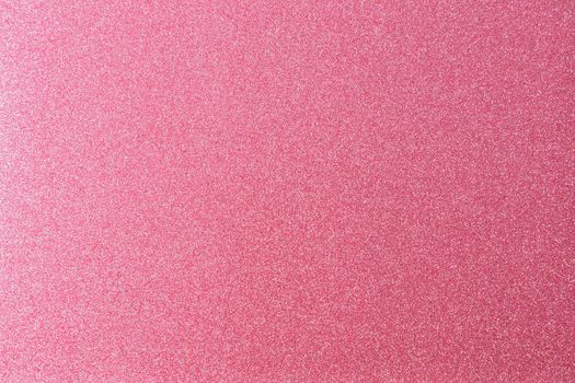 Pink shiny and glittering surface. Abstract background. Events, celebrations. Trendy backdrop for your design. Texture with glitter