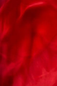 Holiday branding, beauty glamour and love backgrounds concept - Red abstract art background, silk texture and wave lines in motion for classic luxury design