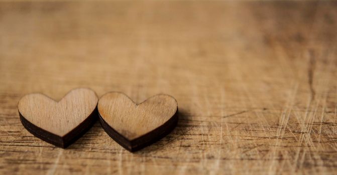 Valentines day concept. Two hearts on wood background. Greeting card concept. Top view. Place for text