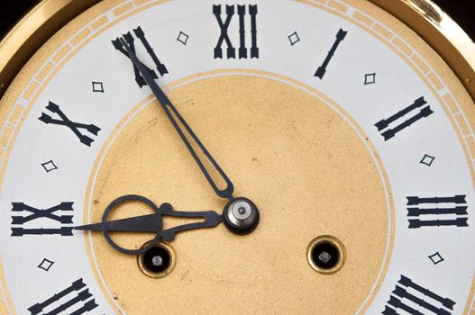 Front view of classic bronze clock 