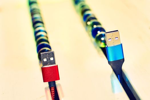 bring together or into contact so that a real or notional link is established. Connect and chat. Blue and red usb cables and colored balloons