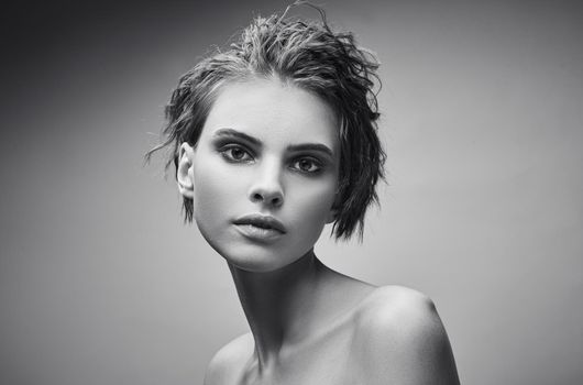 Monochrome glamor portrait of young women. Young sensual model girl posing in studio.