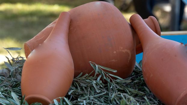 Clay bottles and jugs on the table. High quality photo