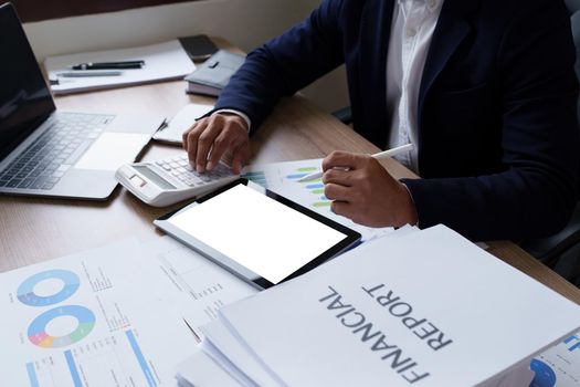 Businessman hand holding pen and pointing at financial paperwork with social network diagram.